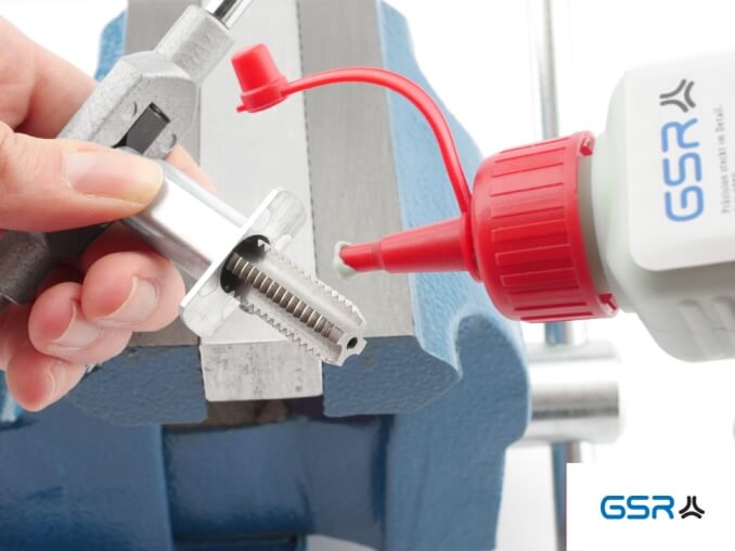 Application of the GSR Hand Tap Guides with clamped tap and adjustable tap wrench and thread paste